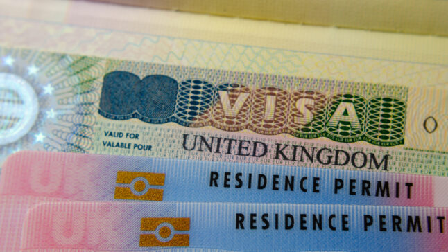 close up of residence permit and visa